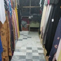 فروش یک باب مغازه پارچه فروشی