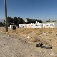 زمین ۱۰۰۰ متری بر جاده نبش پمپ بنزین (دهنو پل فسا)