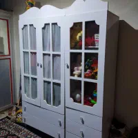 کمد لباس و ویترین اسباب بازی  همراه با تخت فلزی