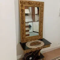 آیینه و ساعت دیواری