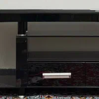 میز تلویزیون شیشه ای در حد نو