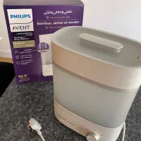 دستگاه استریل شیشه شیر (در حد نو)