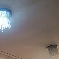 لوستر و کتیبه پرده