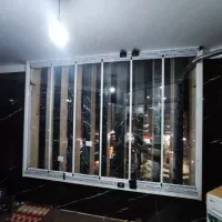فروش و نصب شیشه بالکن ریلی تاشو