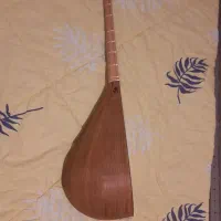 دوتار خراسان جنوبی همراه با کاور