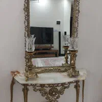 اینه کنسول و شمعدان و ویترین