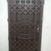 نصب درب حفاظ اکاردئونی ورودی ساختمان|مصالح و تجهیزات ساختمان|رشت, باهنر|دیوار