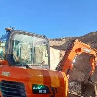 مینی بیل دوسان DX63