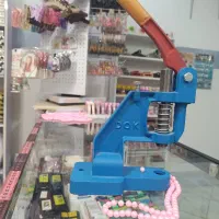 دستگاه پرس دکمه مارک دوک