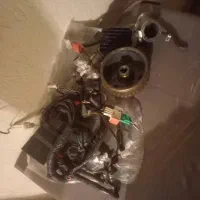 وسایل انژکتور موتور کویر 200 و یک قفل دو شاخ انرژی