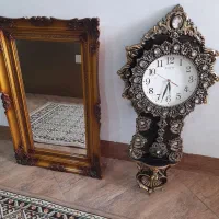 ساعت دیواری و آینه