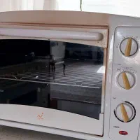 آون توستر برقی