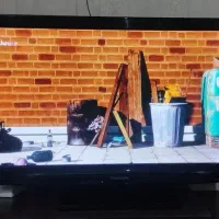 تلویزیون ۴۲ اینچ پاناسونیک و میز