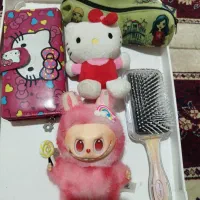 عروسک و کیف پول