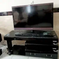 تلویزیون 42اینچ ال جی اصل به همراه میز تلویزیون|تلویزیون و پروژکتور|رباط‌کریم, مسکن مهر آبشناسان|دیوار