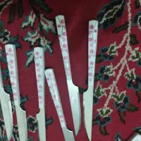 قاشق و چنگال قوری و فنجان نعلبکی