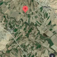 باغ باانواع درخت‌های میوه در روستایی سرچشمه