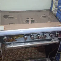 اجاق گاز تمام فر  تکسان  نوع نوع ،اکبندبا کارتون