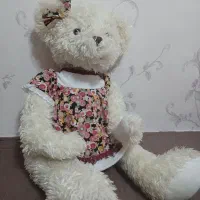 عروسک کرم رنگ