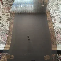 میز پذیرایی شیشه ای با پایه چوبی