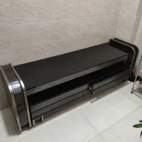 میز وسط جلو مبلی شیشه ای طرح چوب براق شیک