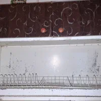 کابینت بالای سینک با آب چکان