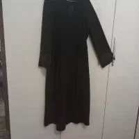 یک عدد مانتو مشکی کشی بلند مجلسی