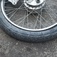 یک دست کامل رینک و لاستیک و درب ترمز عقب موتور