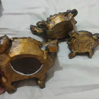 مجسمه سالم|کلکسیون اشیاء عتیقه|اهواز, کوی طلاب|دیوار