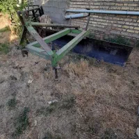 بیل عقب و چرخ آهنی
