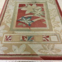 تعدادی قالیچه و پادری