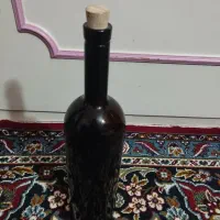 یک عدد شیشه ظرف نگهدارنده آبغوره و آبلیمو