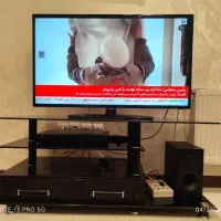 میز تلویزیون شیشه ای ۱۲۰ سانتی متری تا دو روز