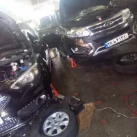 اوستاد کار میکانیک ایرانی و خارجی و یک نفرم شاگرد