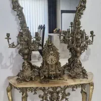 خریدار و فروشنده آیینه و شمعدان