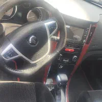 دنا پلاس اتوماتیک اپشنال مدل 1403سفید|خودرو سواری و وانت|اصفهان, باغ زرشک|دیوار