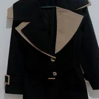 لباس بارانی|لباس|قم, نیروگاه|دیوار
