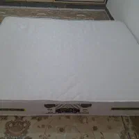 تشک . تختخواب