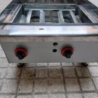 گریل زغالی حرفه‌ای در حد نو با میز