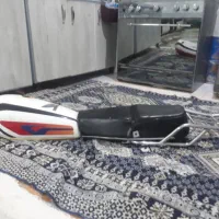 تعدادی لوازم موتور هندا(( زین و باک و ترکبند ))