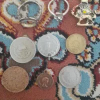 عتیقه سکه های شاهنشاهی و انگشتر او زنجیر