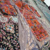 دوزنده لباس|لباس|ایرانشهر, |دیوار