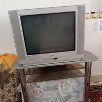 میزtvهمراه با تلویزیون ۲۱اینچ
