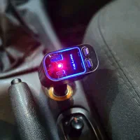 شارژر فندکی با کابل جمعشونده و نور لیزر کهکشانی