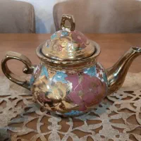 ظرف  و ظروف  و میوه خوری و ماگ و قوری با کپ
