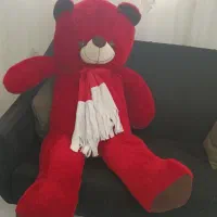 عروسک خرس بزرگ و اسباب بازی