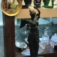 مجسمه اباژور برنز پرنده به دست برنزی