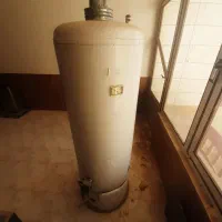 آب گرمکن مخزنی و سینک هود درب