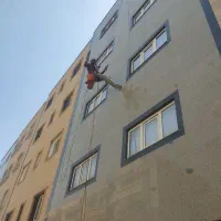 شستشوی نما نماشویی ساختمان پیچ رولپلاک سنگ نما