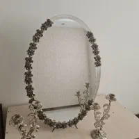 آینه روشویی و آینه و شمعدان